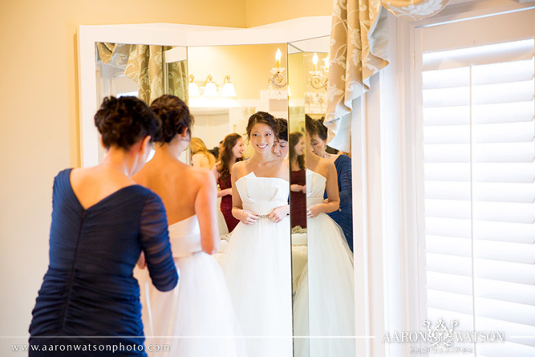 mom helping with dress