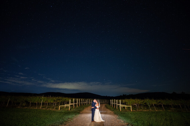 Best Charlottesville Wedding Venue Keswick Vineyards bride and groom night photography