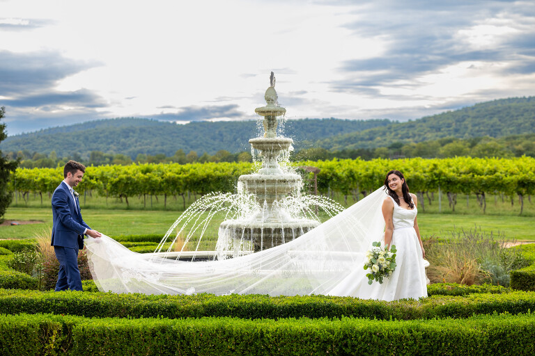 bride and groom cathedral veil keswick vineyards fountain