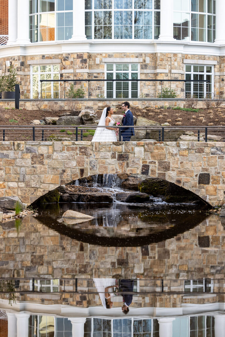 hotel garden bride and groom couples first look on bridge photo idea