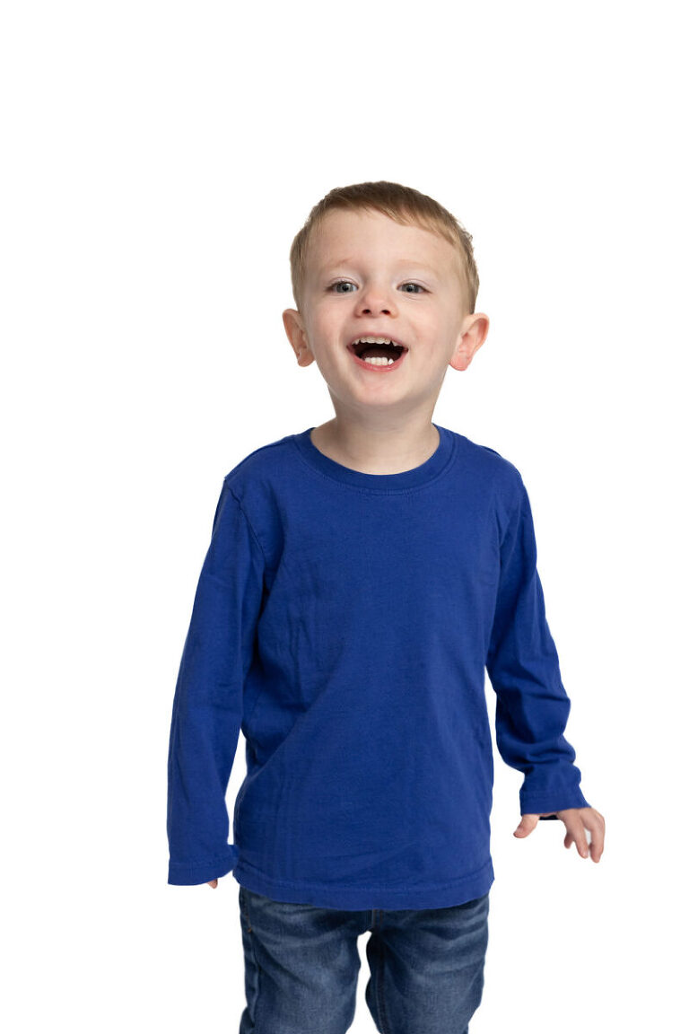 Kid laughing during family portrait session